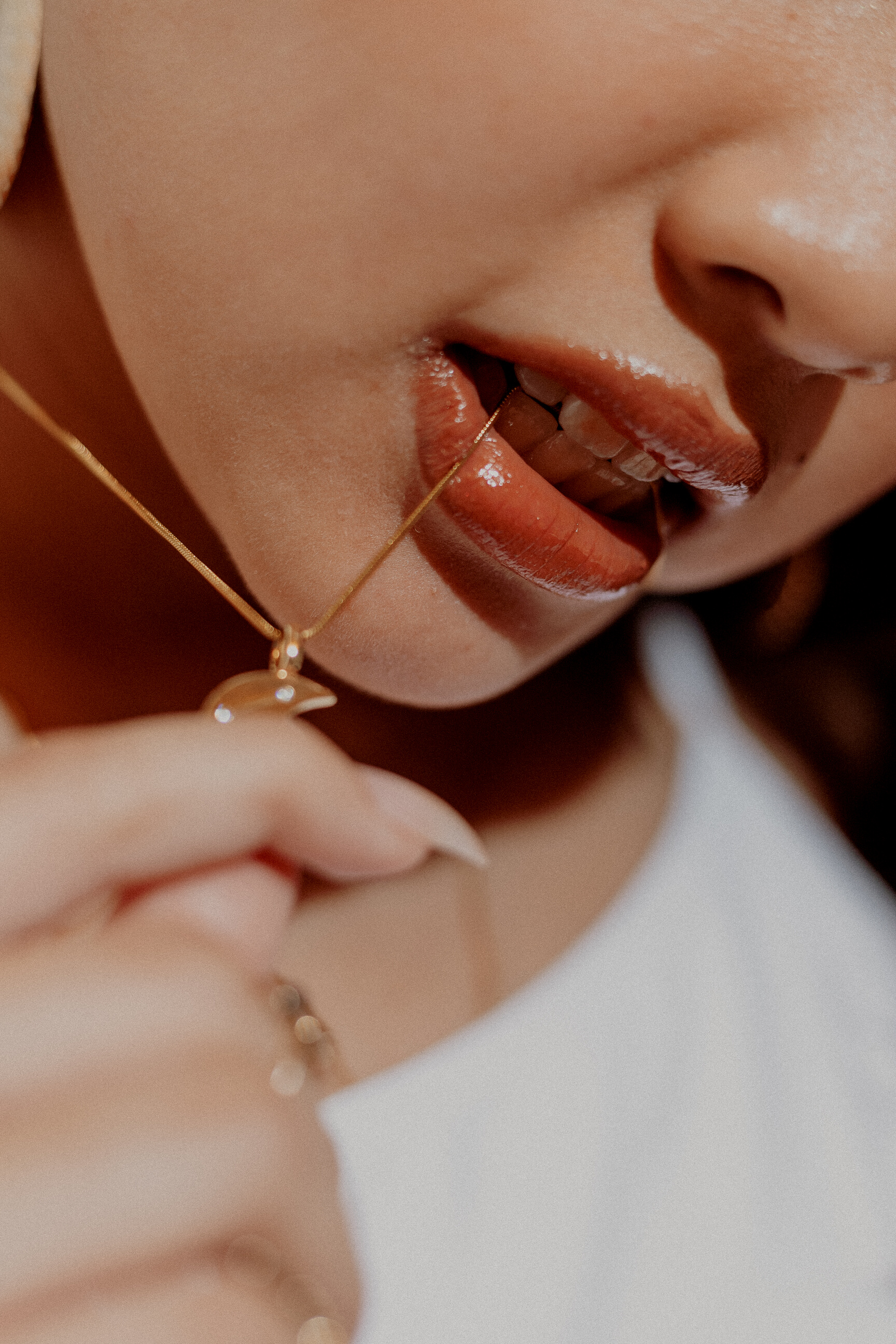 Woman Biting Her Necklace